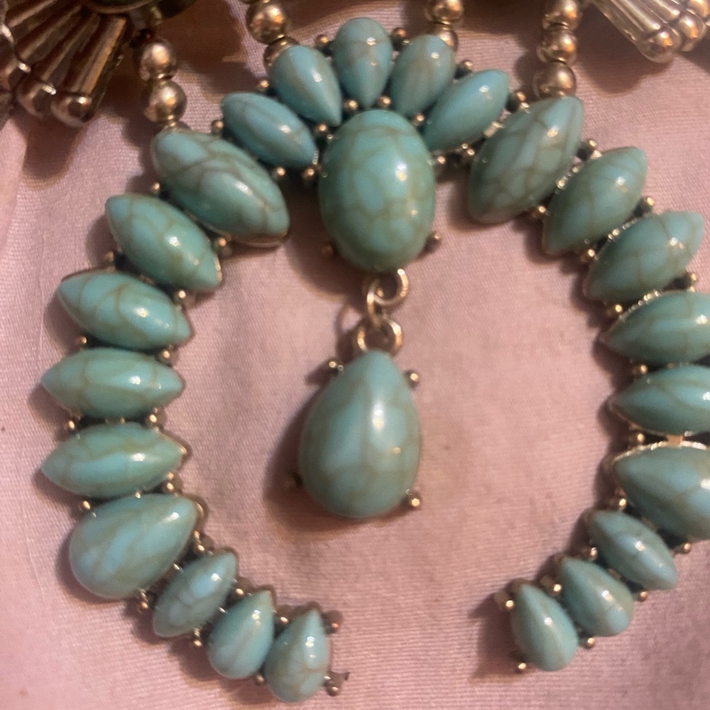 Elegant Blue Teardrop Earrings with Polished Finish